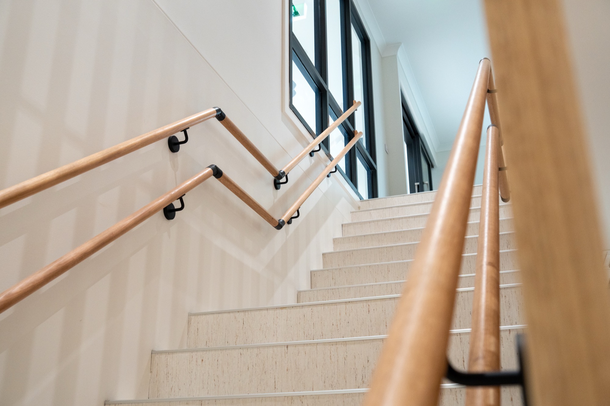 Stairwell with timber handrail