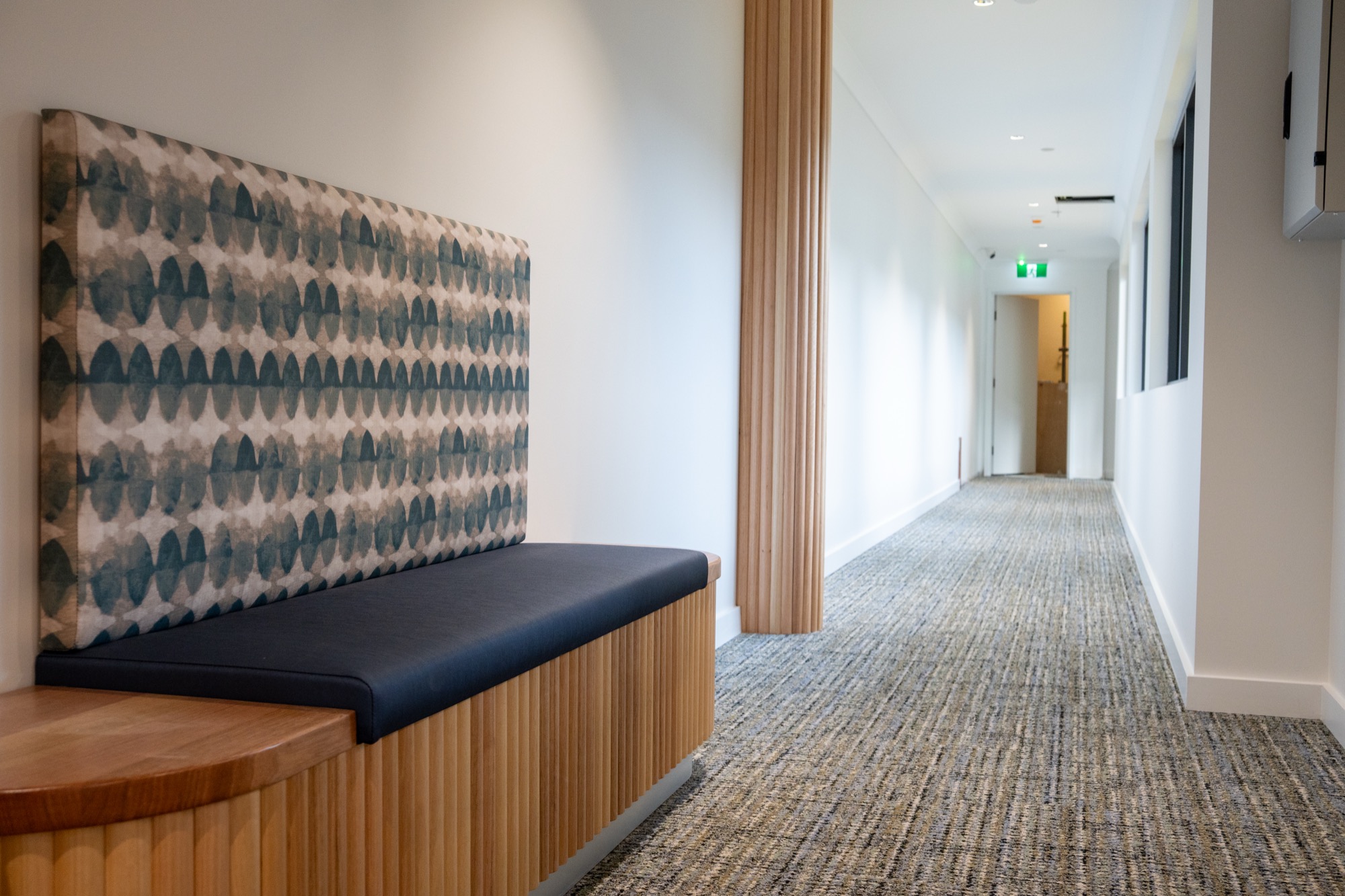 Hallway with custom banquette